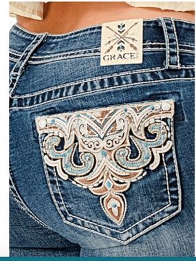 NWT Grace in LA bootcut with embellished pocket.   Inseam 34 mid rise